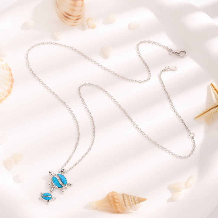 Collana con ciondolo a doppia tartaruga in opale blu Olivenorma