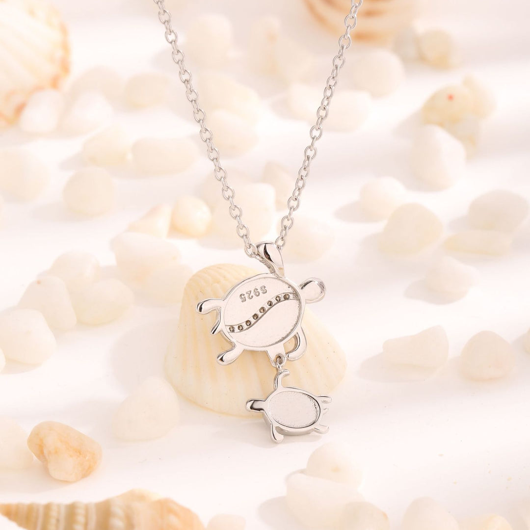 Collana con ciondolo a doppia tartaruga in opale blu Olivenorma