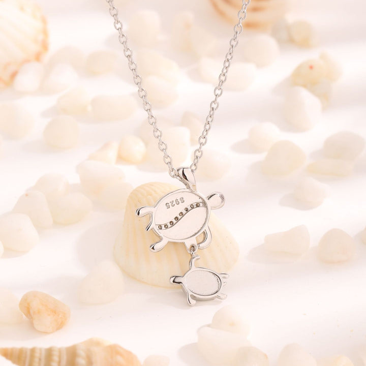 Collana con ciondolo a doppia tartaruga in opale blu Olivenorma