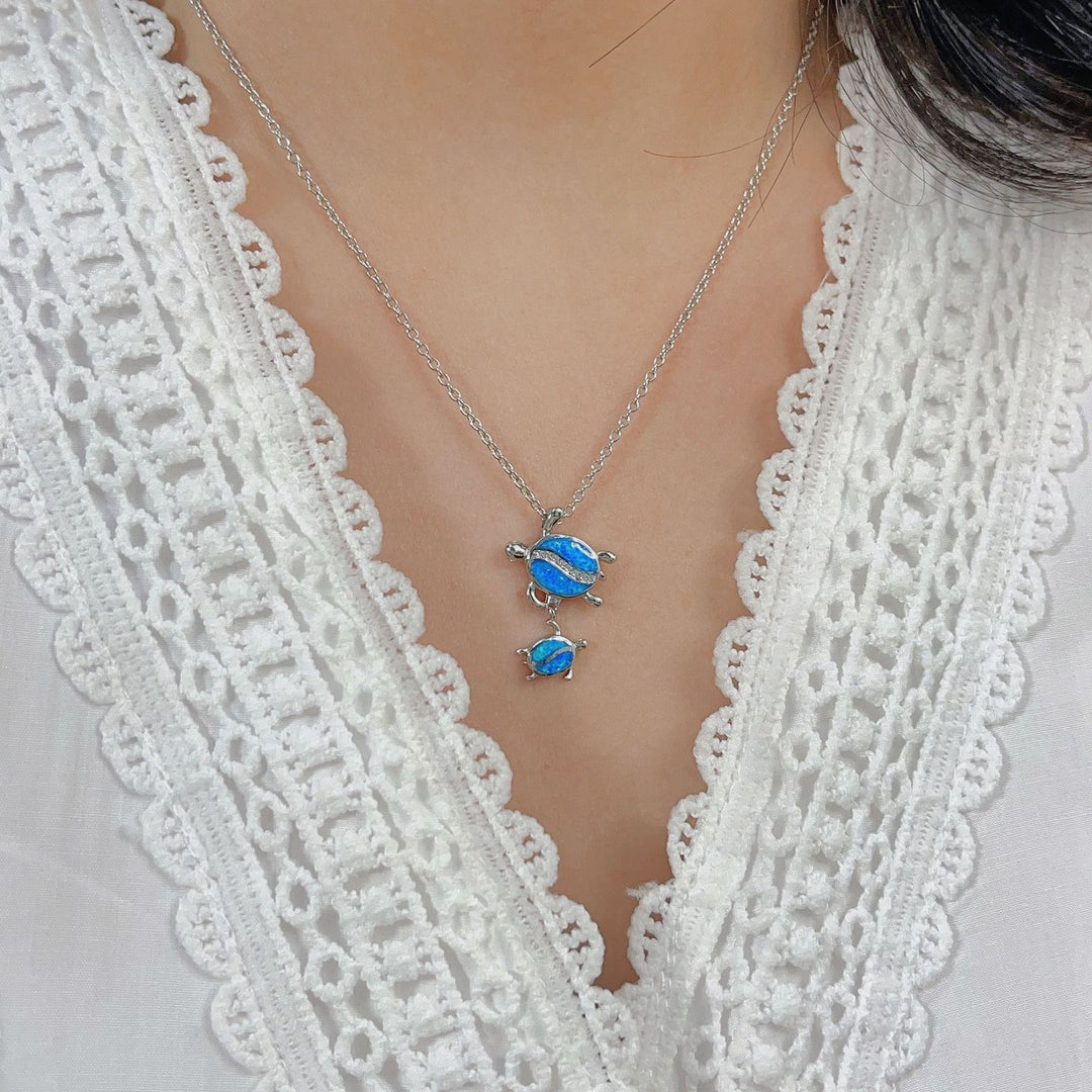 Collana con ciondolo a doppia tartaruga in opale blu Olivenorma