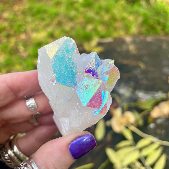 Decorazione con pietre preziose in cluster di quarzo aura di angelo Olivenorma