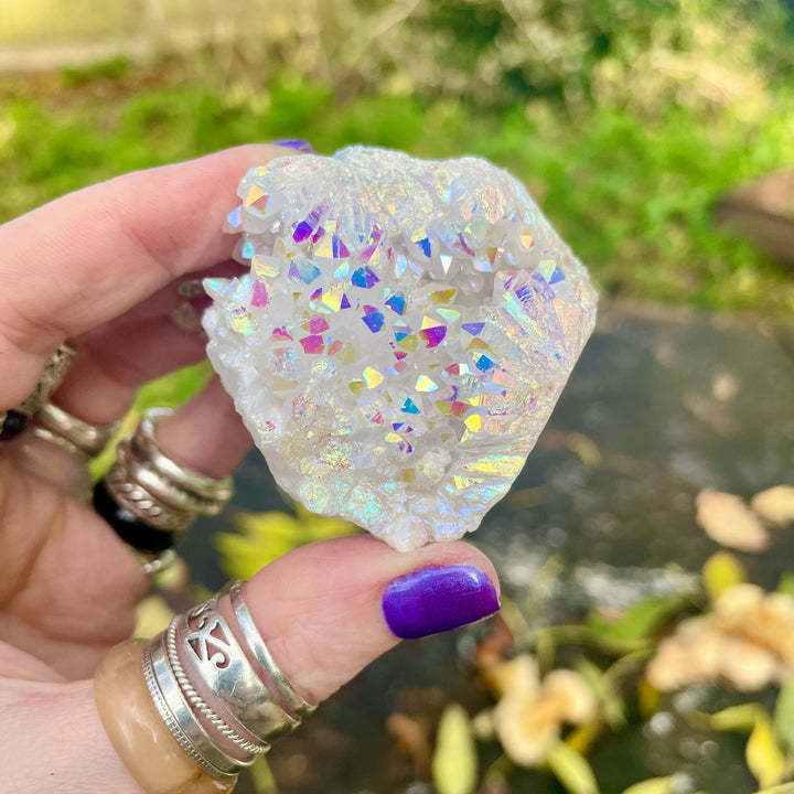 Decorazione con pietre preziose in cluster di quarzo aura di angelo Olivenorma