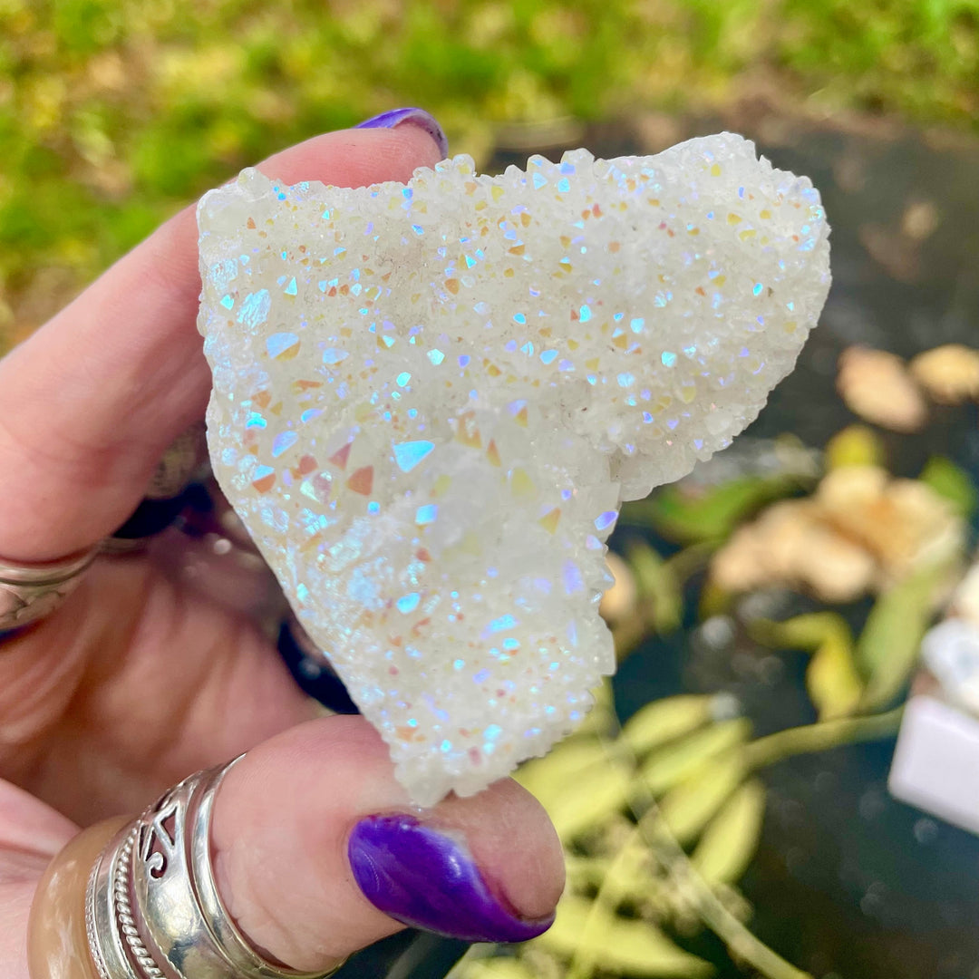 Decorazione con pietre preziose in cluster di quarzo aura di angelo Olivenorma