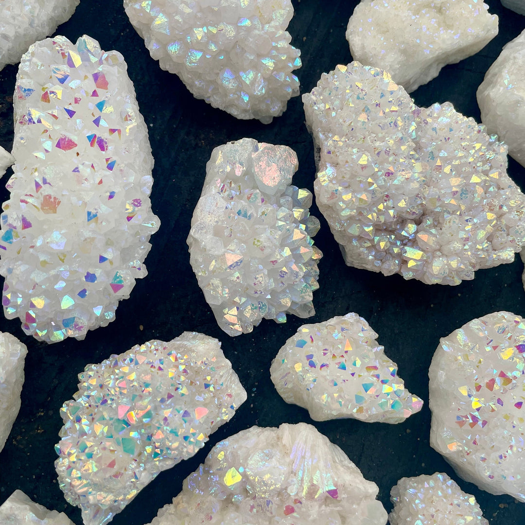 Decorazione con pietre preziose in cluster di quarzo aura di angelo Olivenorma