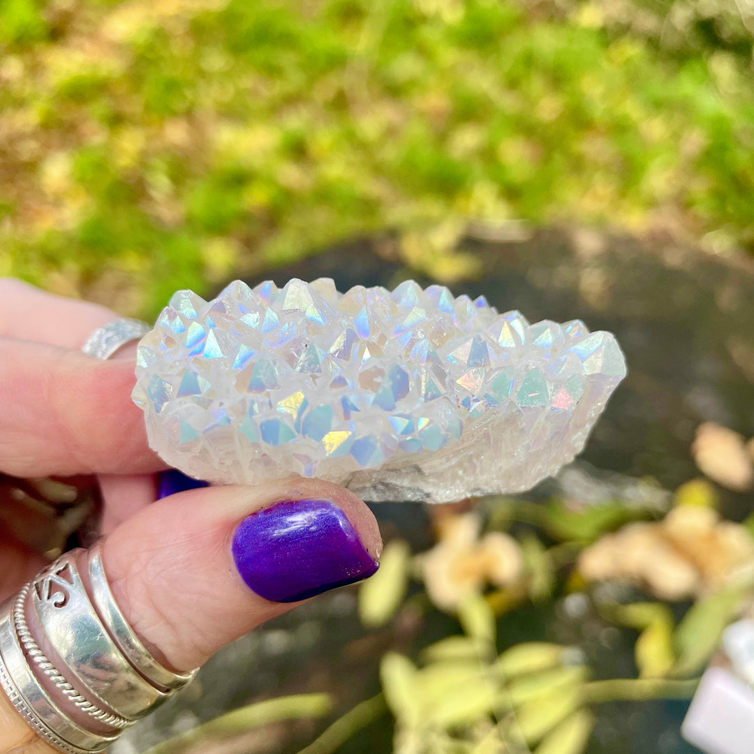 Decorazione con pietre preziose in cluster di quarzo aura di angelo Olivenorma