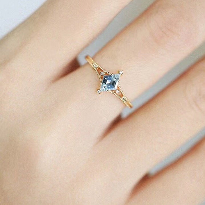 Anello di guarigione a forma di stella con topazio blu e ametista Olivenorma