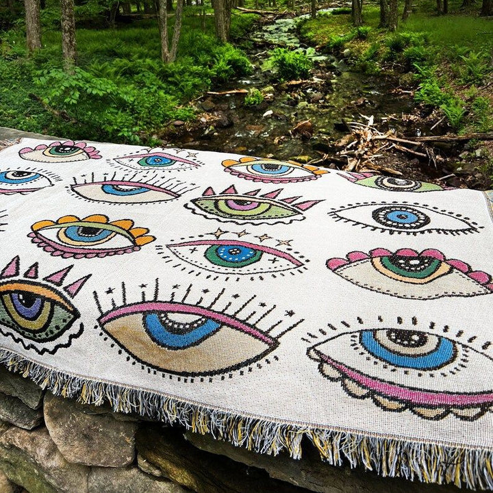 Olivenorma Coperta tessuta con nappe in stile indiano con malocchio blu e bianco