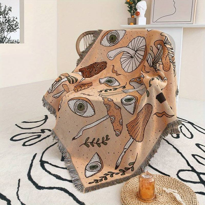 Olivenorma Coperta con stampa etnica lavorata a maglia bohémien e nappa