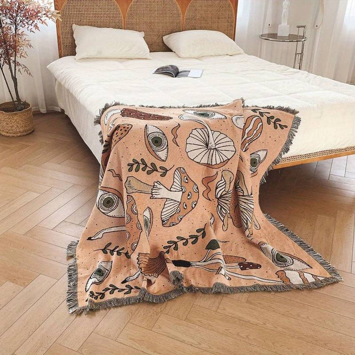 Olivenorma Coperta con stampa etnica lavorata a maglia bohémien e nappa