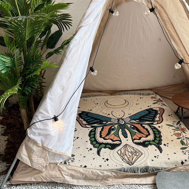 Coperta con nappa intrecciata a farfalla Olivenorma