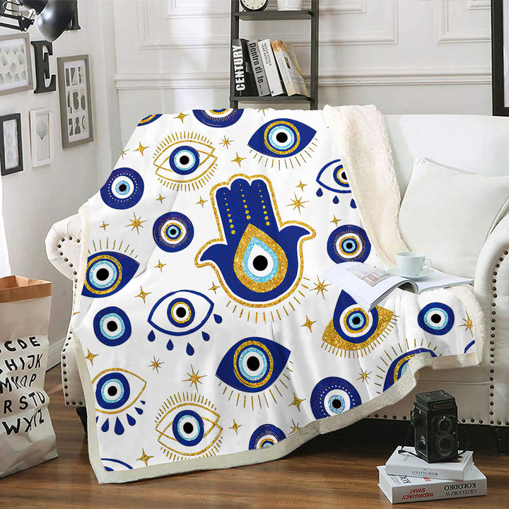 Olivenorma Coperta in flanella intrecciata Hamsa con occhio maligno bianco e blu