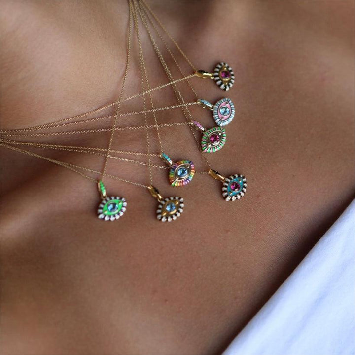 Collana con occhio malvagio in acciaio e titanio con zirconi colorati Olivenorma
