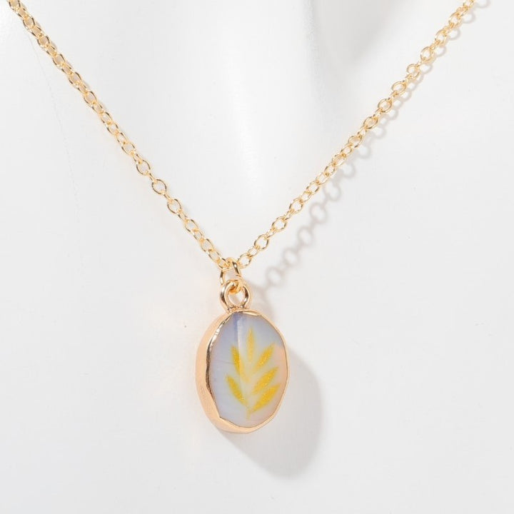 Collana con farfalla, stella e luna in pietra naturale Olivenorma