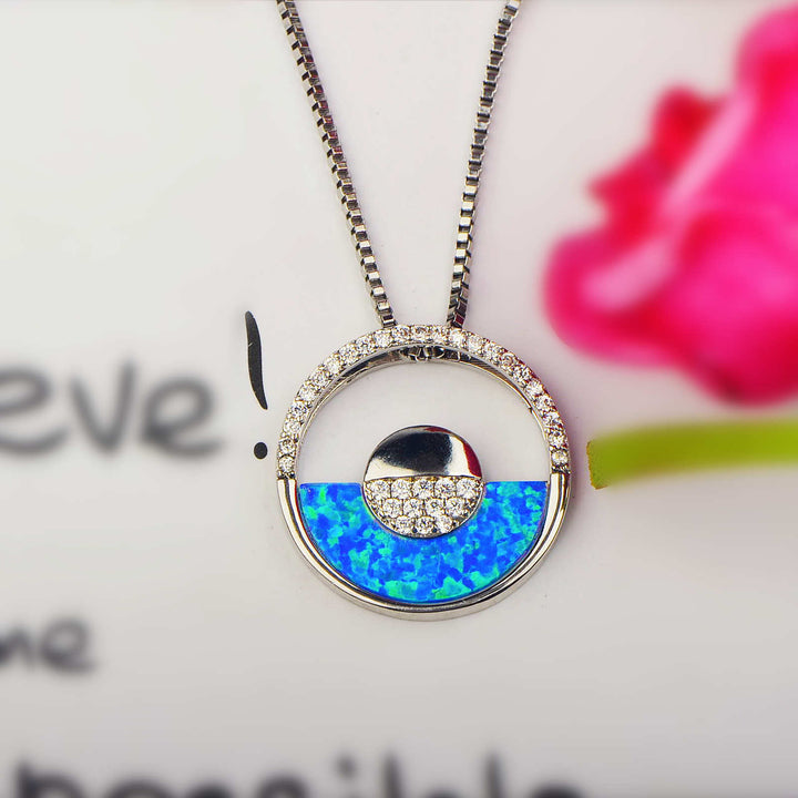 Collana con ciondolo rotondo in opale blu hawaiano Olivenorma