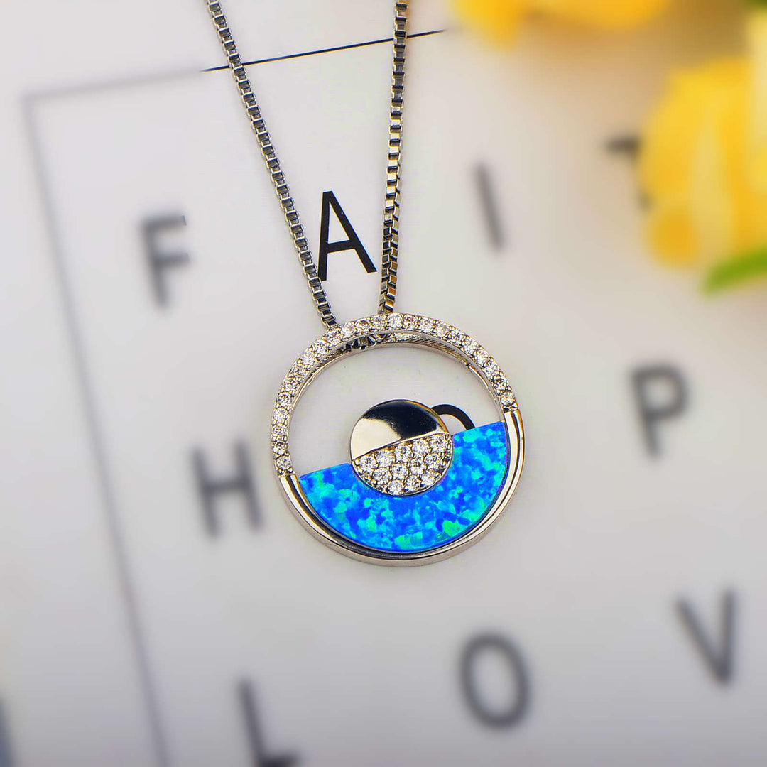Collana con ciondolo rotondo in opale blu hawaiano Olivenorma