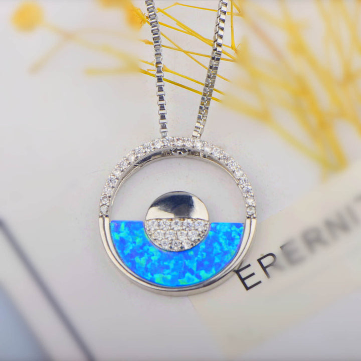 Collana con ciondolo rotondo in opale blu hawaiano Olivenorma