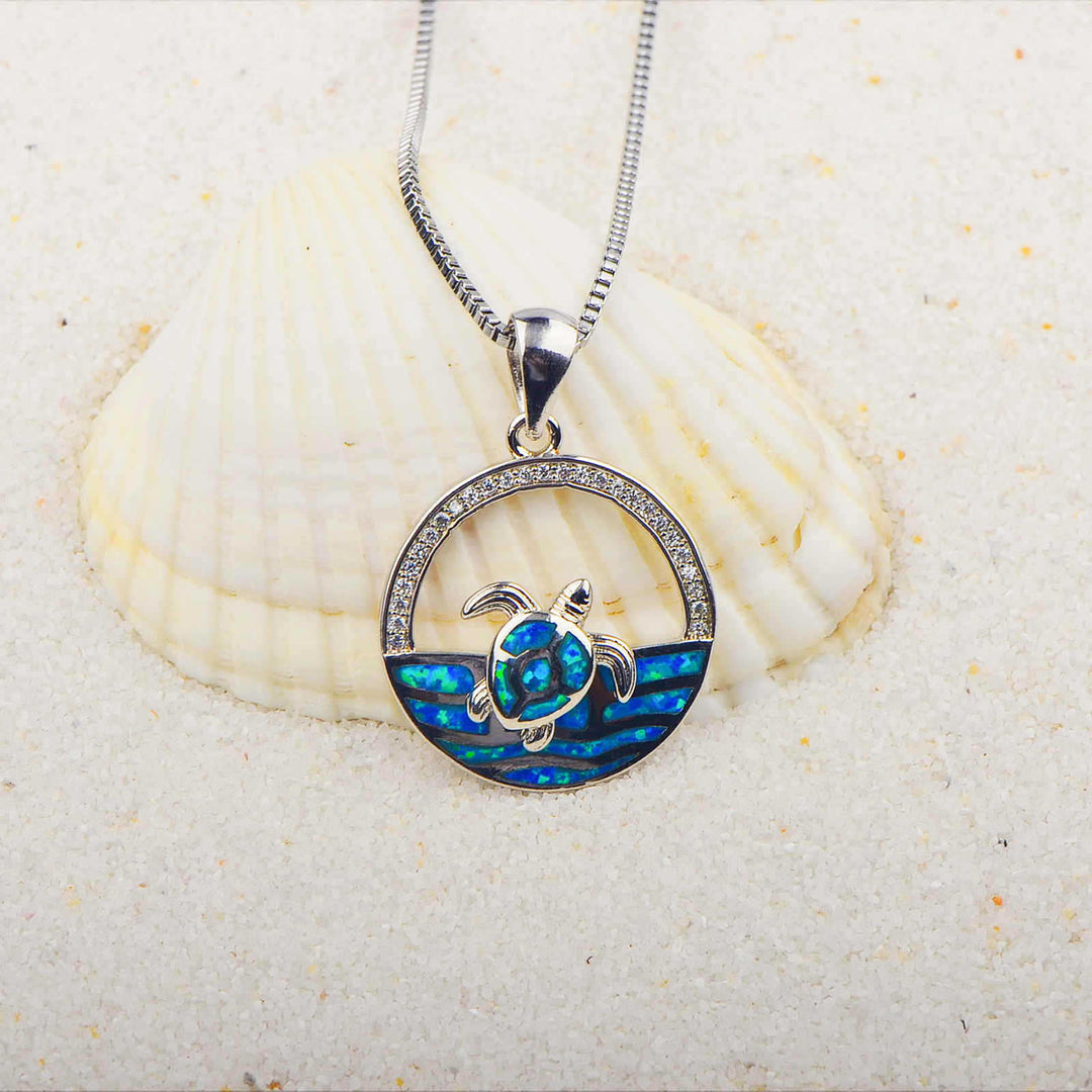 Collana con ciondolo tartaruga nuotatrice in opale blu hawaiano Olivenorma