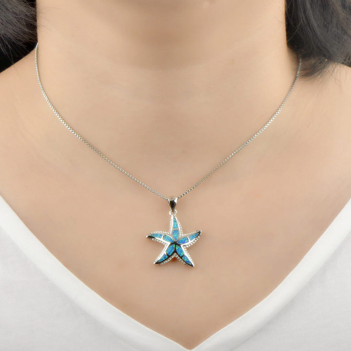 Collana con ciondolo stella marina in blu opale e bianco Olivenorma