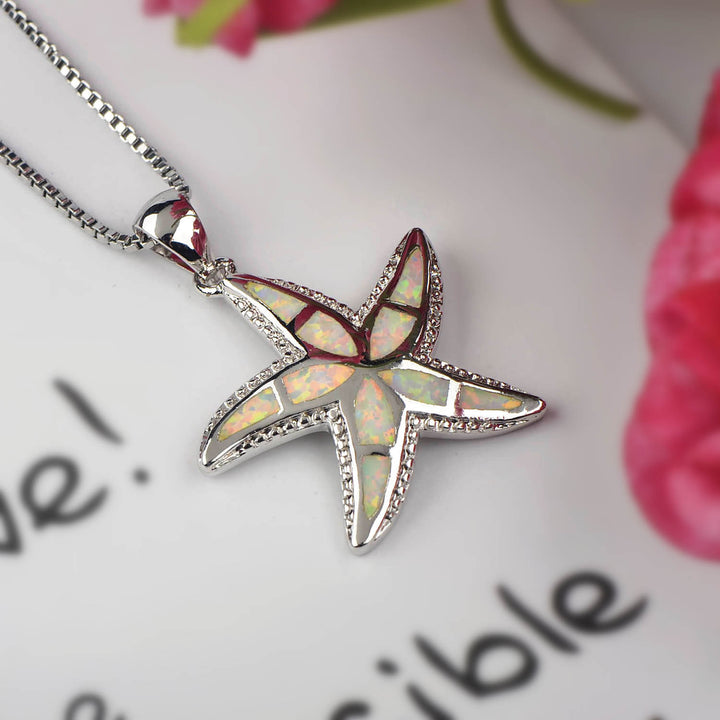 Collana con ciondolo stella marina in blu opale e bianco Olivenorma