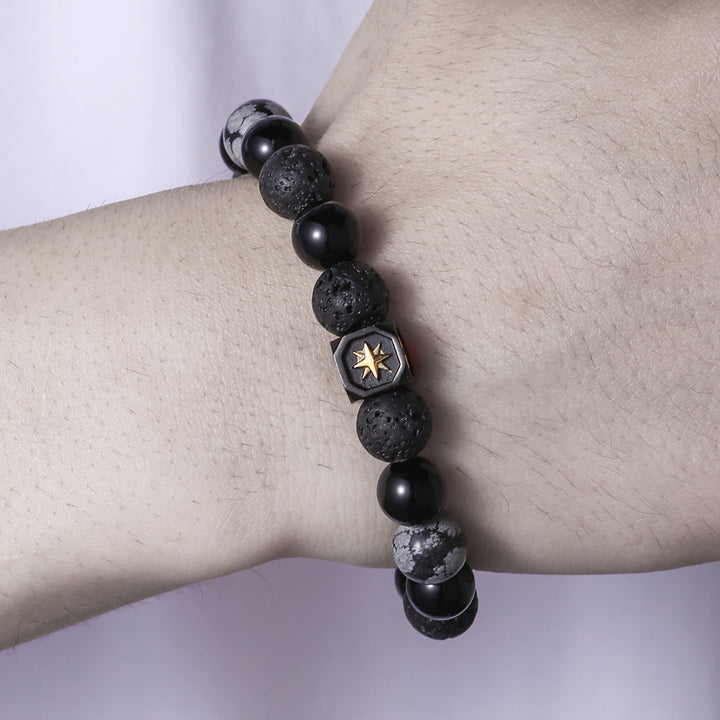 Bracciale da uomo Olivenorma con stella a otto punte in pietra lavica e ossidiana con fiocco di neve