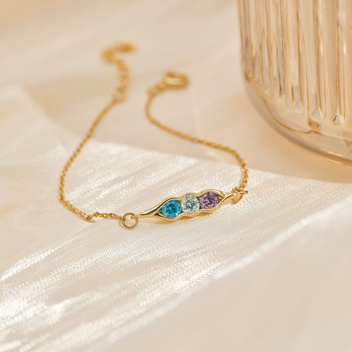 Bracciale Olivenorma con clip a forma di pisello, zircone bianco, ametista e acquamarina