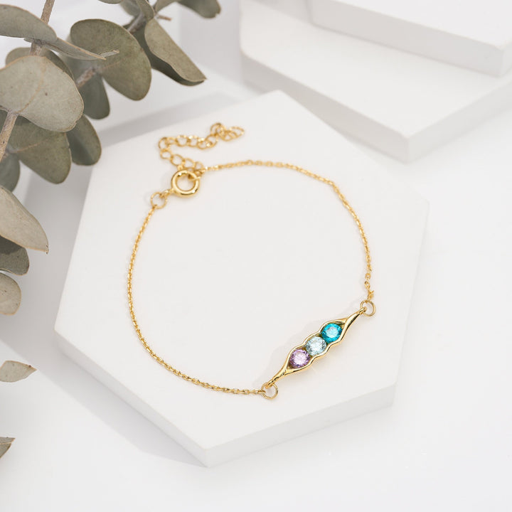 Bracciale Olivenorma con clip a forma di pisello, zircone bianco, ametista e acquamarina