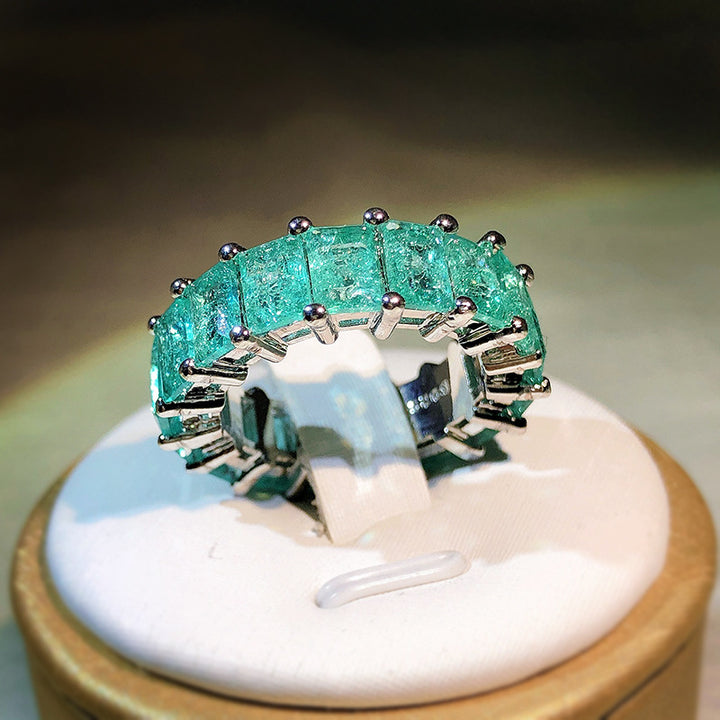 Anello quadrato affiancato con tormalina Paraiba Olivenorma