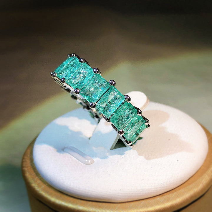 Anello quadrato affiancato con tormalina Paraiba Olivenorma