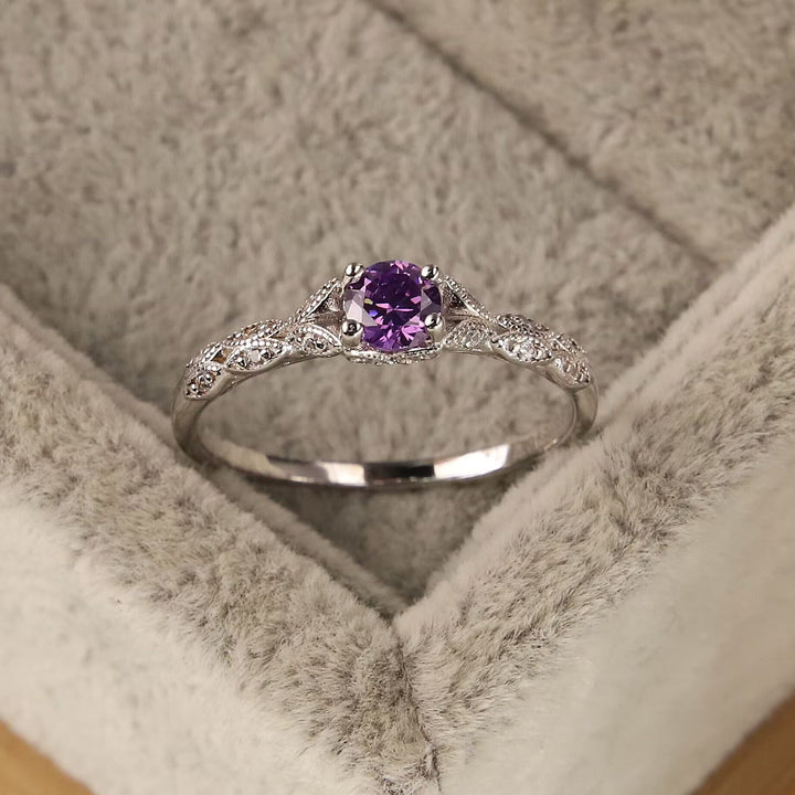 Anello semplice con zirconi viola intarsiati Olivenorma