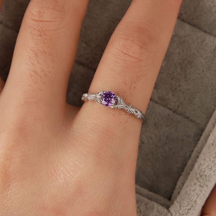 Anello semplice con zirconi viola intarsiati Olivenorma