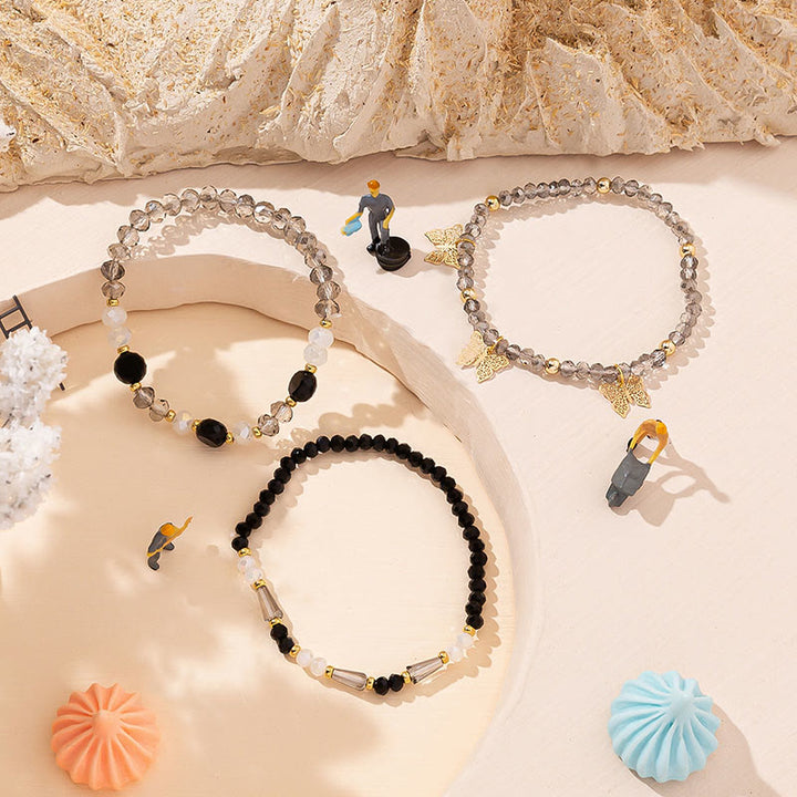 Olivenorma - Set di bracciali a tre strati con ciondolo a farfalla in oro con perline di cristallo