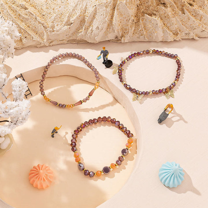 Olivenorma - Set di bracciali a tre strati con ciondolo a farfalla in oro con perline di cristallo