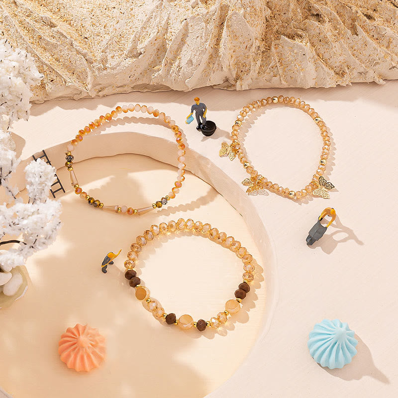 Olivenorma - Set di bracciali a tre strati con ciondolo a farfalla in oro con perline di cristallo