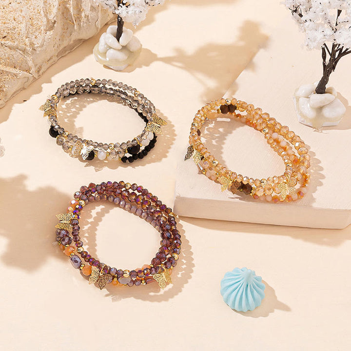 Olivenorma - Set di bracciali a tre strati con ciondolo a farfalla in oro con perline di cristallo