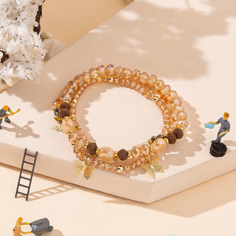 Olivenorma - Set di bracciali a tre strati con ciondolo a farfalla in oro con perline di cristallo