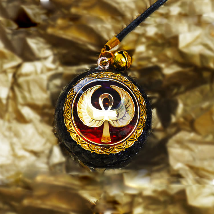 Collana Olivenorma in arenaria blu, agata rossa e OM Orgone