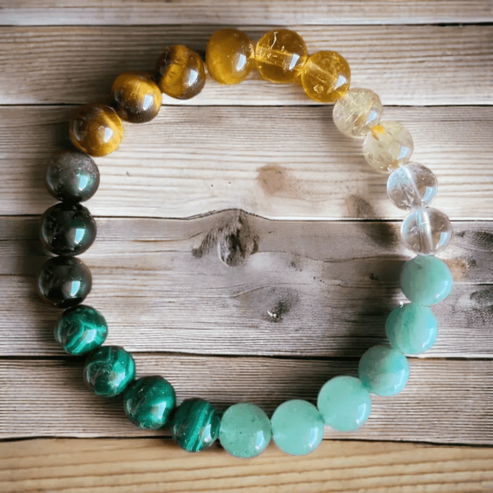 Braccialetto con soldi in malachite e occhio di tigre Olivenorma