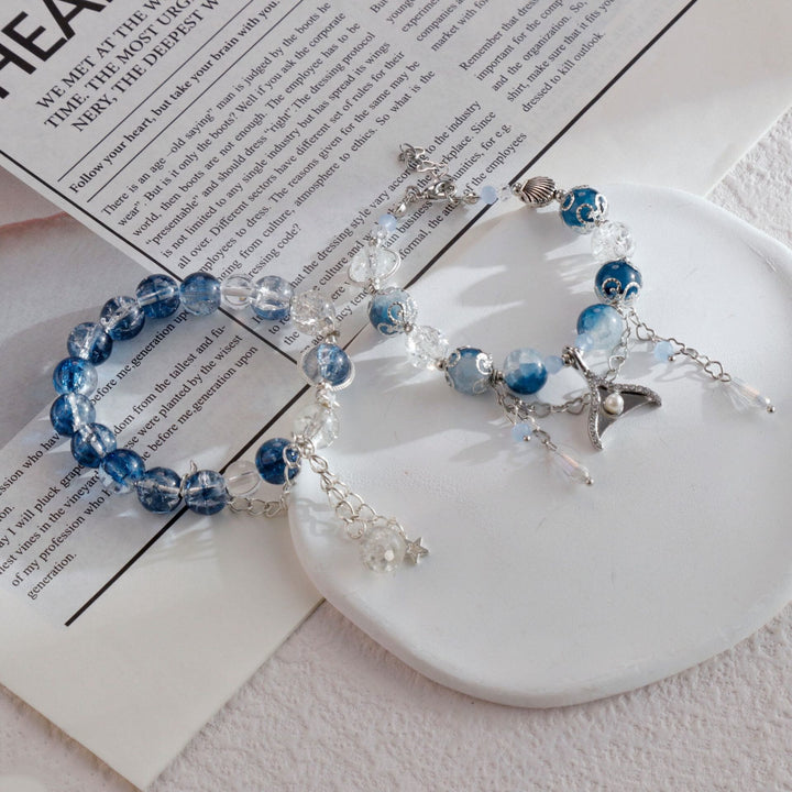 Bracciale Olivenorma in cristallo di vetro a contrasto blu e bianco - image 0