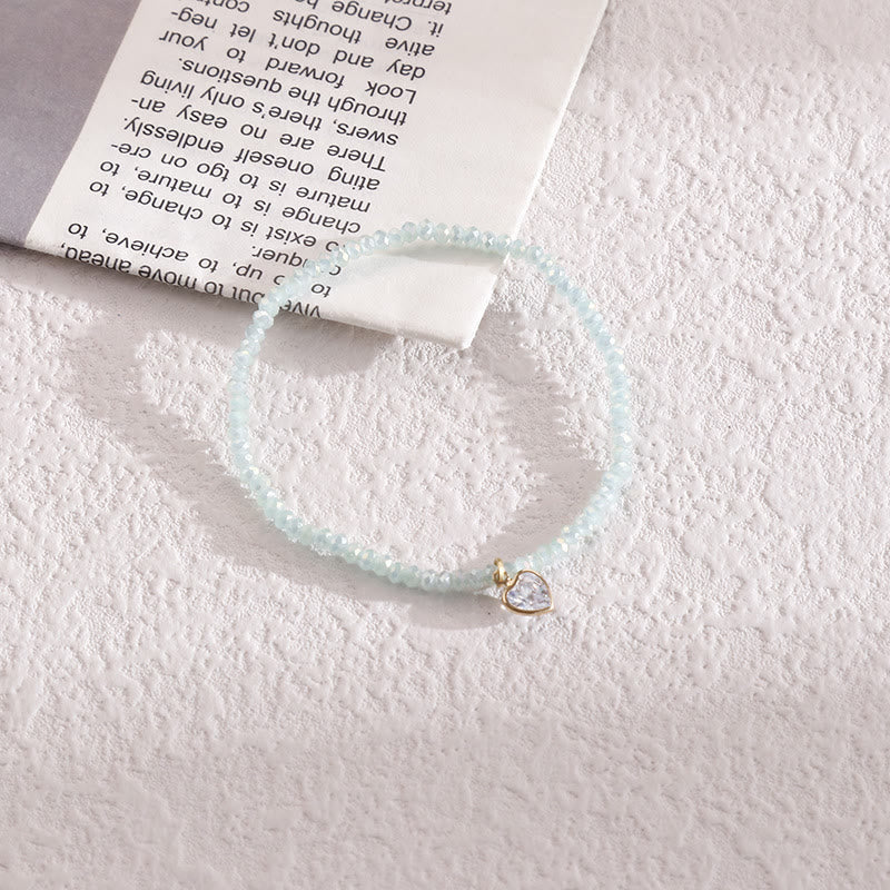 Olivenorma Braccialetto con perline di riso colorate e ciondolo in zircone bianco