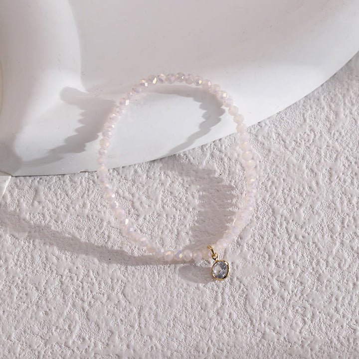 Olivenorma Braccialetto con perline di riso colorate e ciondolo in zircone bianco