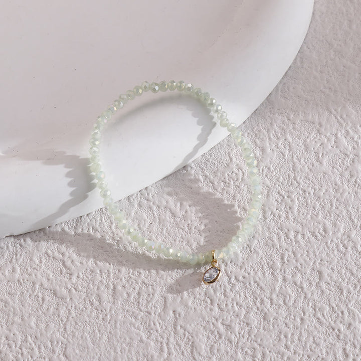 Olivenorma Braccialetto con perline di riso colorate e ciondolo in zircone bianco