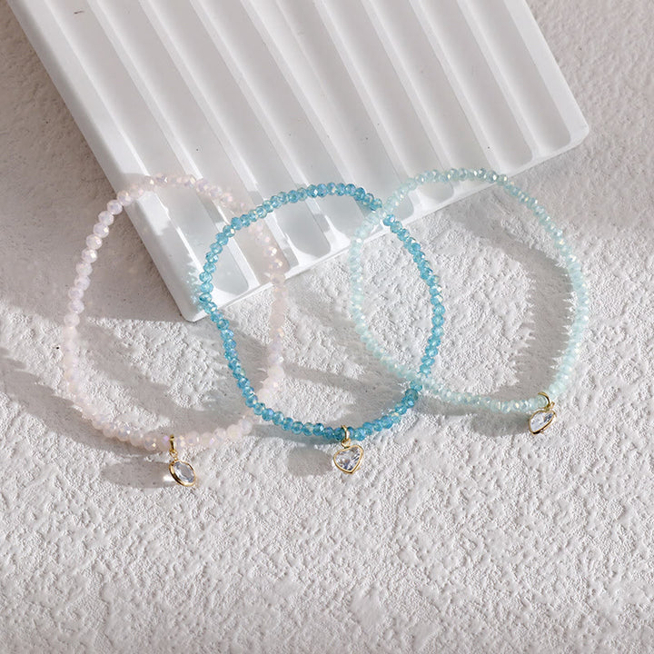 Olivenorma Braccialetto con perline di riso colorate e ciondolo in zircone bianco