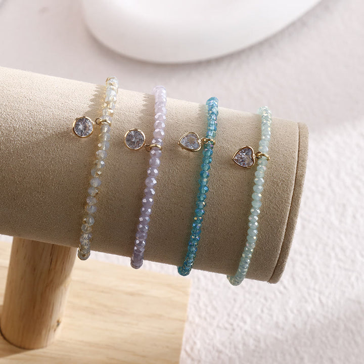 Olivenorma Braccialetto con perline di riso colorate e ciondolo in zircone bianco