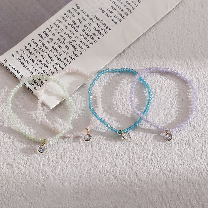 Olivenorma Braccialetto con perline di riso colorate e ciondolo in zircone bianco