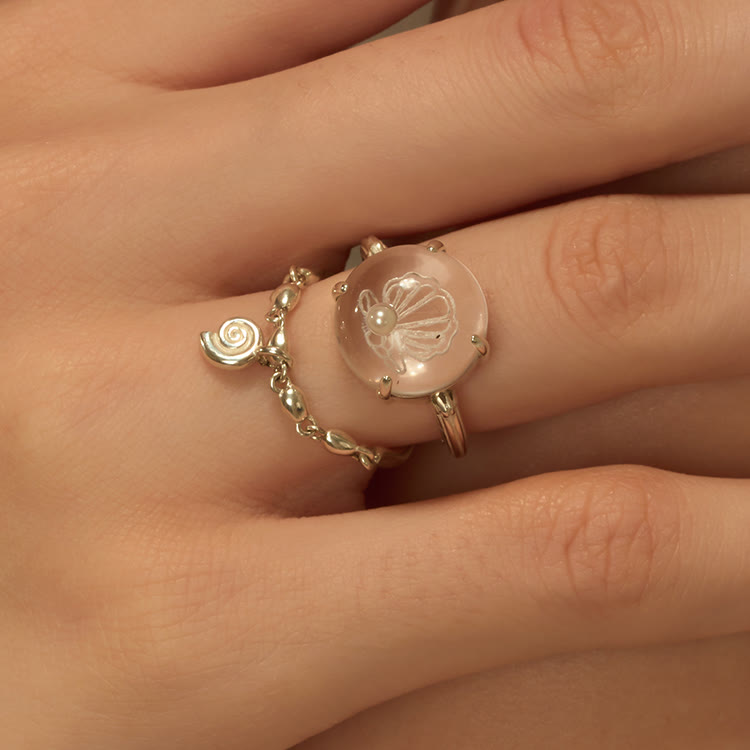 Anello Olivenorma con design a conchiglia in cristallo trasparente e perla - image 0