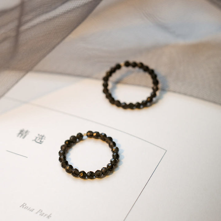 Anello Olivenorma con perline di ossidiana sfaccettata extra fine da 3 mm