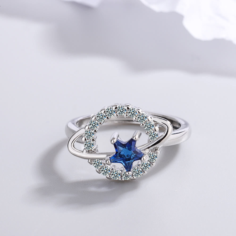 Olivenorma Anello regolabile con pentagramma, topazio blu e zircone bianco