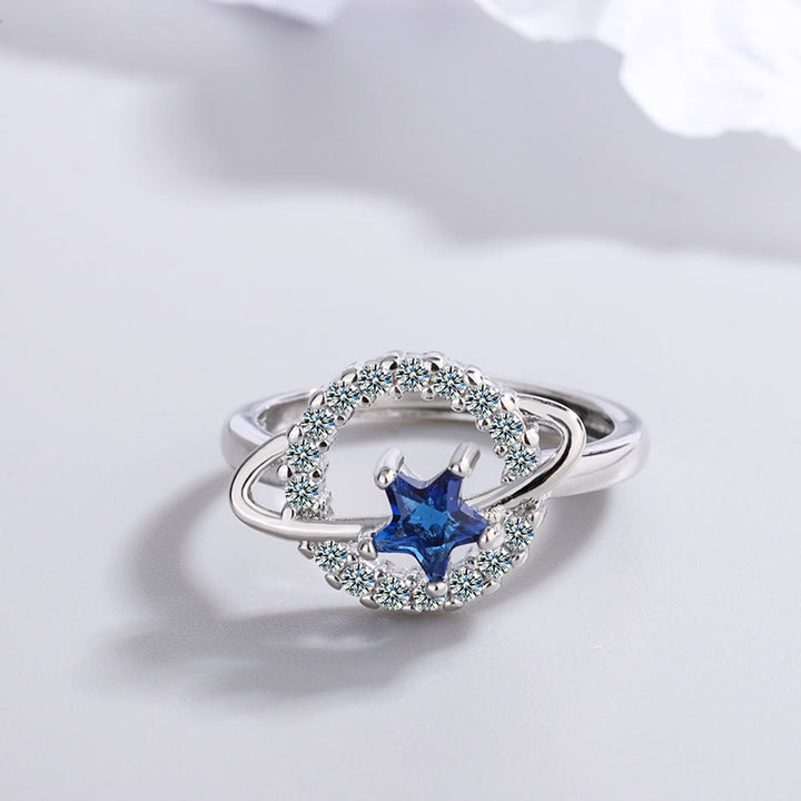 Olivenorma Anello regolabile con pentagramma, topazio blu e zircone bianco