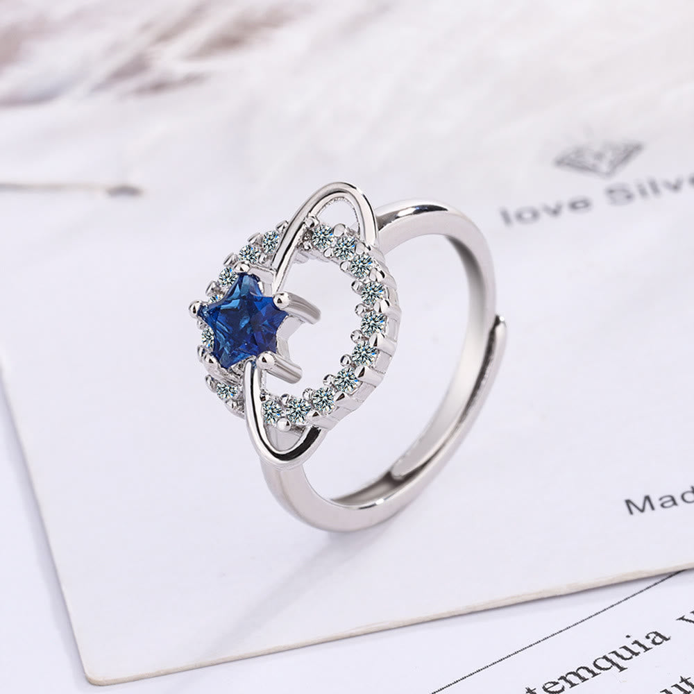Olivenorma Anello regolabile con pentagramma, topazio blu e zircone bianco