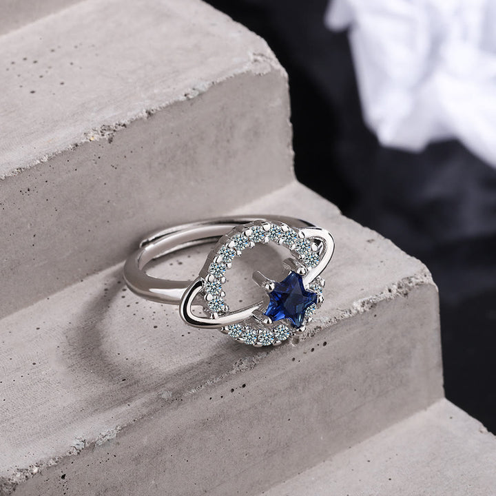 Olivenorma Anello regolabile con pentagramma, topazio blu e zircone bianco
